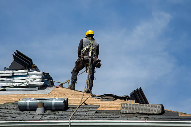 Professional Roofing technician working in Pacific, WA